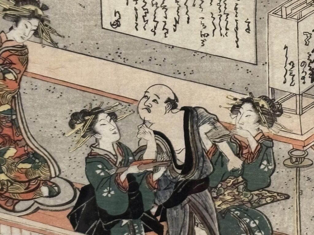 遊郭から摘み出される酔客